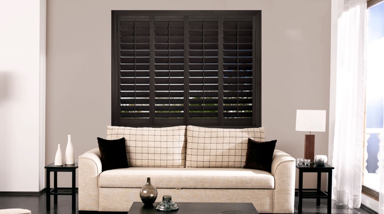 Gainesville sunroom with plantation shutters.